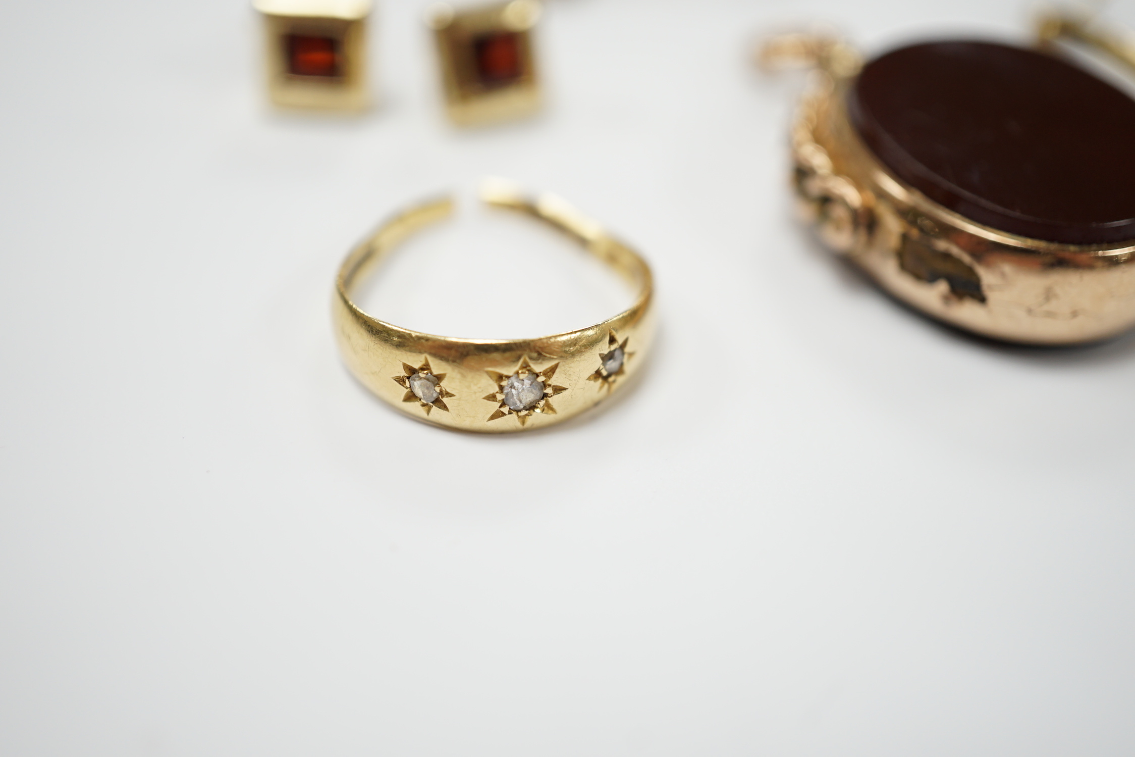 A group of Victorian and later jewellery including a yellow metal overlaid, carnelian and bloodstone set fob, yellow metal and seed pearl set cane bar brooch, earrings, ring etc.